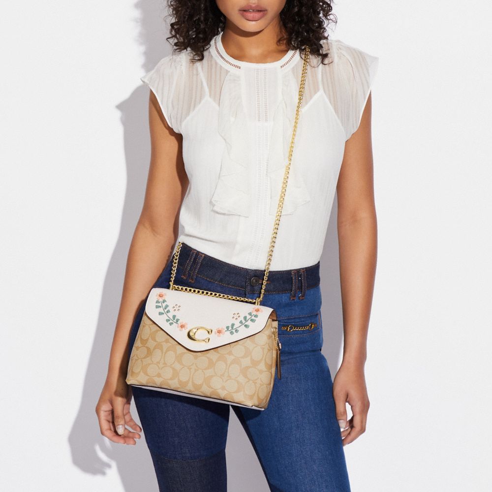 Tammie Shoulder Bag In Signature Canvas With Floral Whipstitch