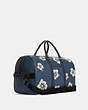 COACH®,VENTURER BAG WITH ALOHA FLORAL PRINT,X-Large,Gunmetal/Denim/Cream,Angle View