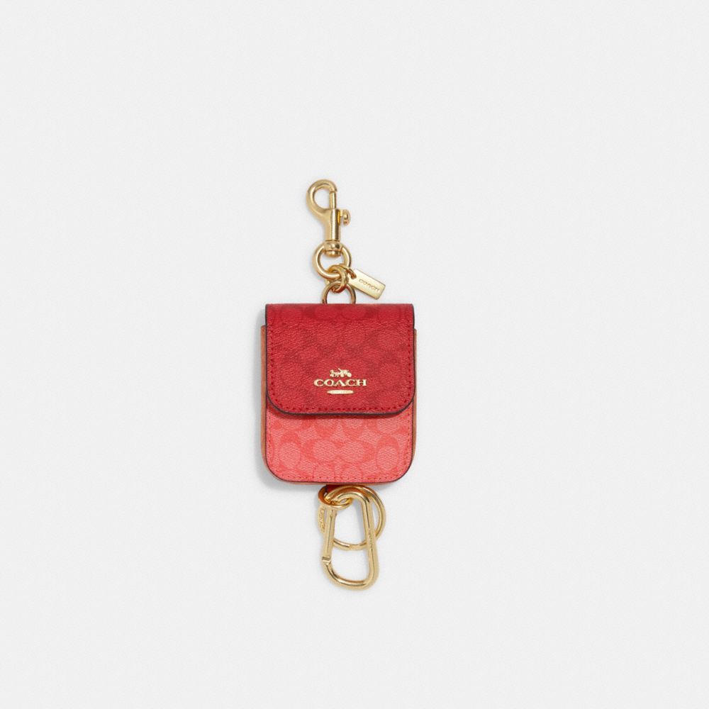 Coach Outlet Women's Mini Saddle Bag Charm In Signature Canvas - Gold/light Khaki Multi