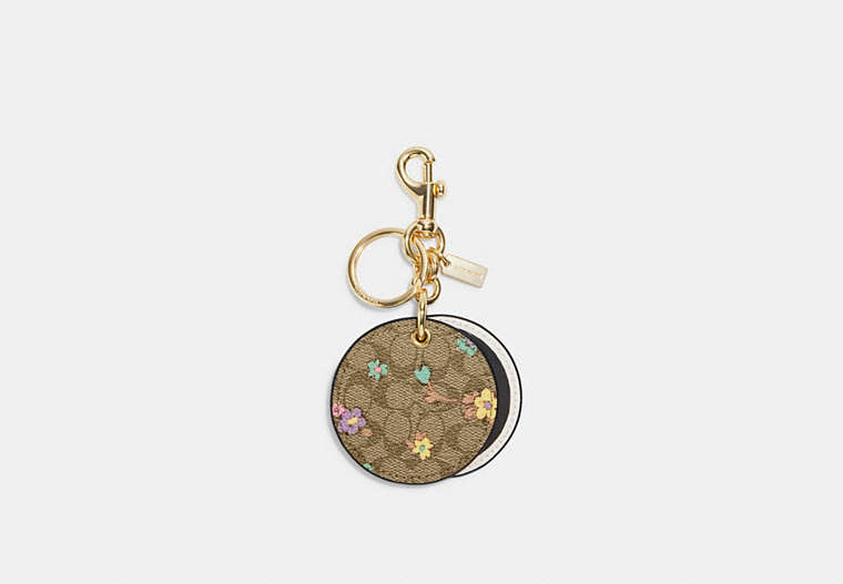 COACH®,MIRROR BAG CHARM IN SIGNATURE CANVAS WITH SPACED FLORAL PRINT,Gold/Khaki Purple Multi,Front View