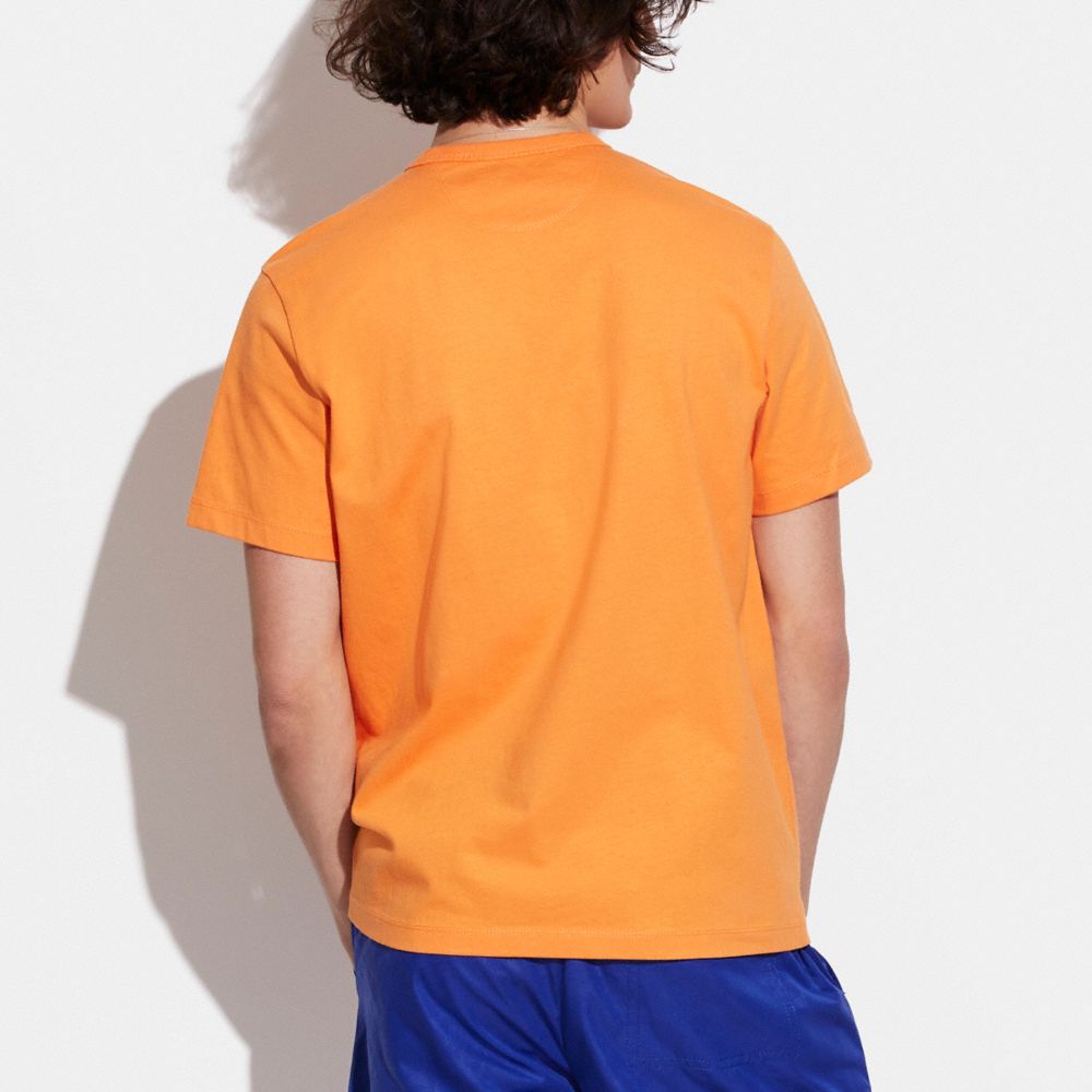 COACH®,REXY SCHOOL T-SHIRT IN ORGANIC COTTON,Tangerine,Scale View