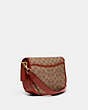 COACH®,WILLOW SADDLE BAG IN SIGNATURE CANVAS,Coated Canvas,Small,Brass/Tan/Rust,Angle View