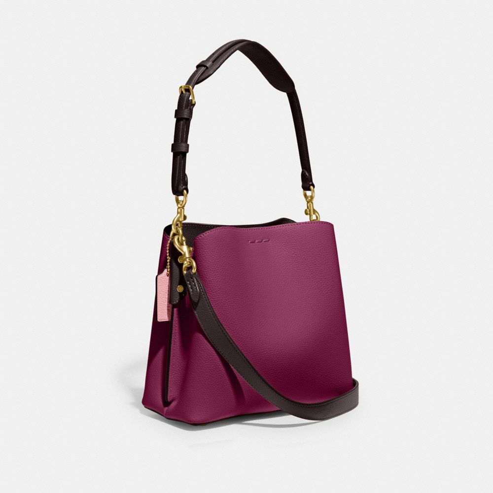 COACH®,WILLOW BUCKET BAG IN COLORBLOCK WITH SIGNATURE CANVAS INTERIOR,Coated Canvas,Medium,Brass/Deep Plum Multi,Angle View