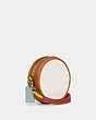 COACH®,KIA CIRCLE BAG IN COLORBLOCK,Natural Pebble Leather,Small,Brass/Chalk Multi,Angle View