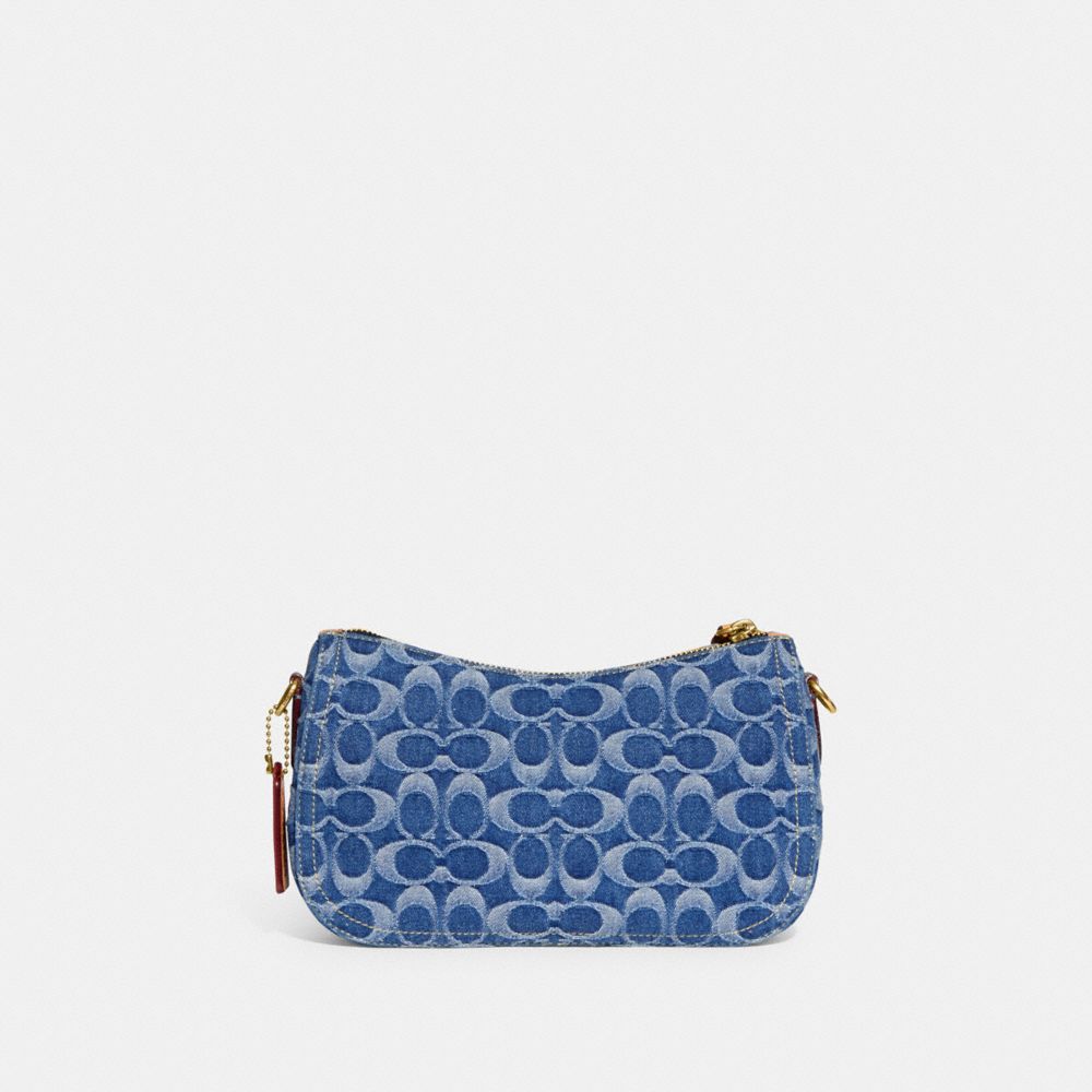 COACH®,SWINGER BAG IN SIGNATURE DENIM,Medium,Brass/Indigo Midnight Navy Multi,Back View