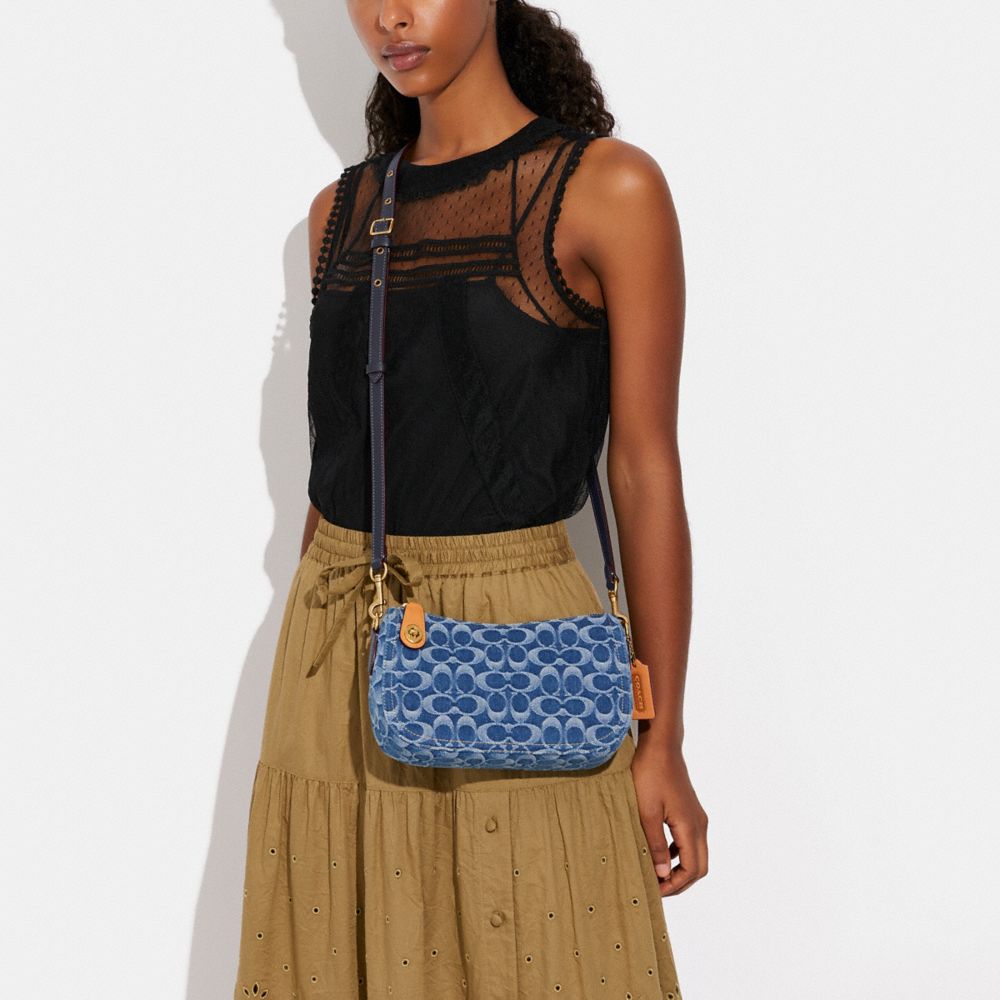 COACH®,Swinger Bag In Signature Denim,,Detail View