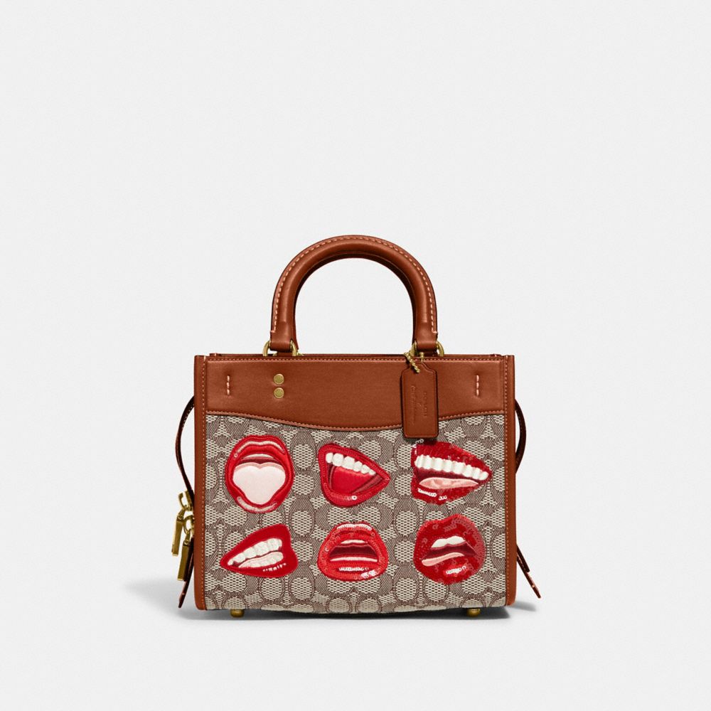 COACH®,ROGUE 25 EN TISSU JACQUARD SIGNATURE COACH X TOM WESSELMANN,Jacquard exclusif,Laiton/Cacao ambre poli,Front View