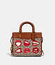 COACH®,COACH X TOM WESSELMANN ROGUE 25 IN SIGNATURE TEXTILE JACQUARD,Signature Jacquard,Medium,Brass/Cocoa Burnished Amb,Front View