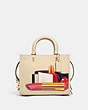 COACH®,COACH X TOM WESSELMANN ROGUE BAG 25,Glovetan Leather,Medium,Brass/Ivory,Front View