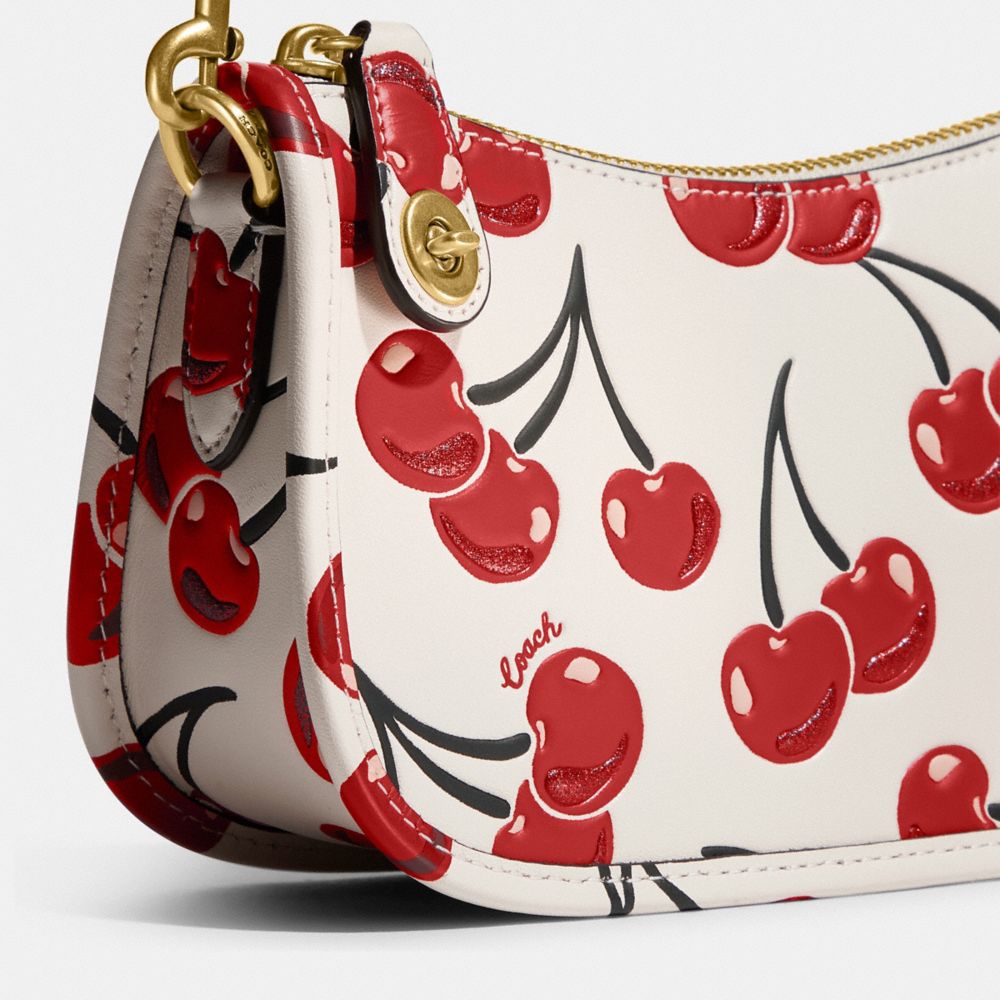 Cherry coach purse new arrivals