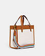 COACH®,FIELD TOTE 22 WITH PATCHES,Pebble Leather,Medium,Brass/Chalk Multi,Angle View