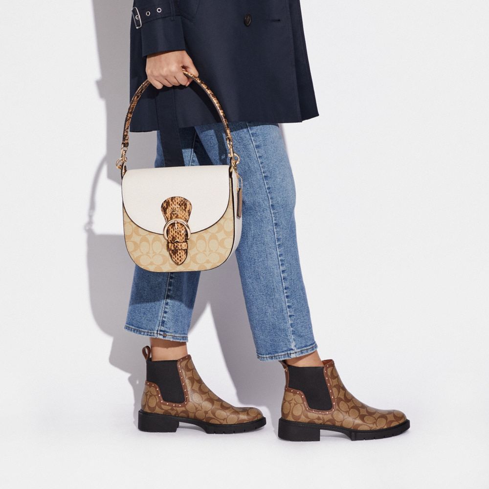 Kleo Shoulder Bag 23 In Blocked Signature Canvas