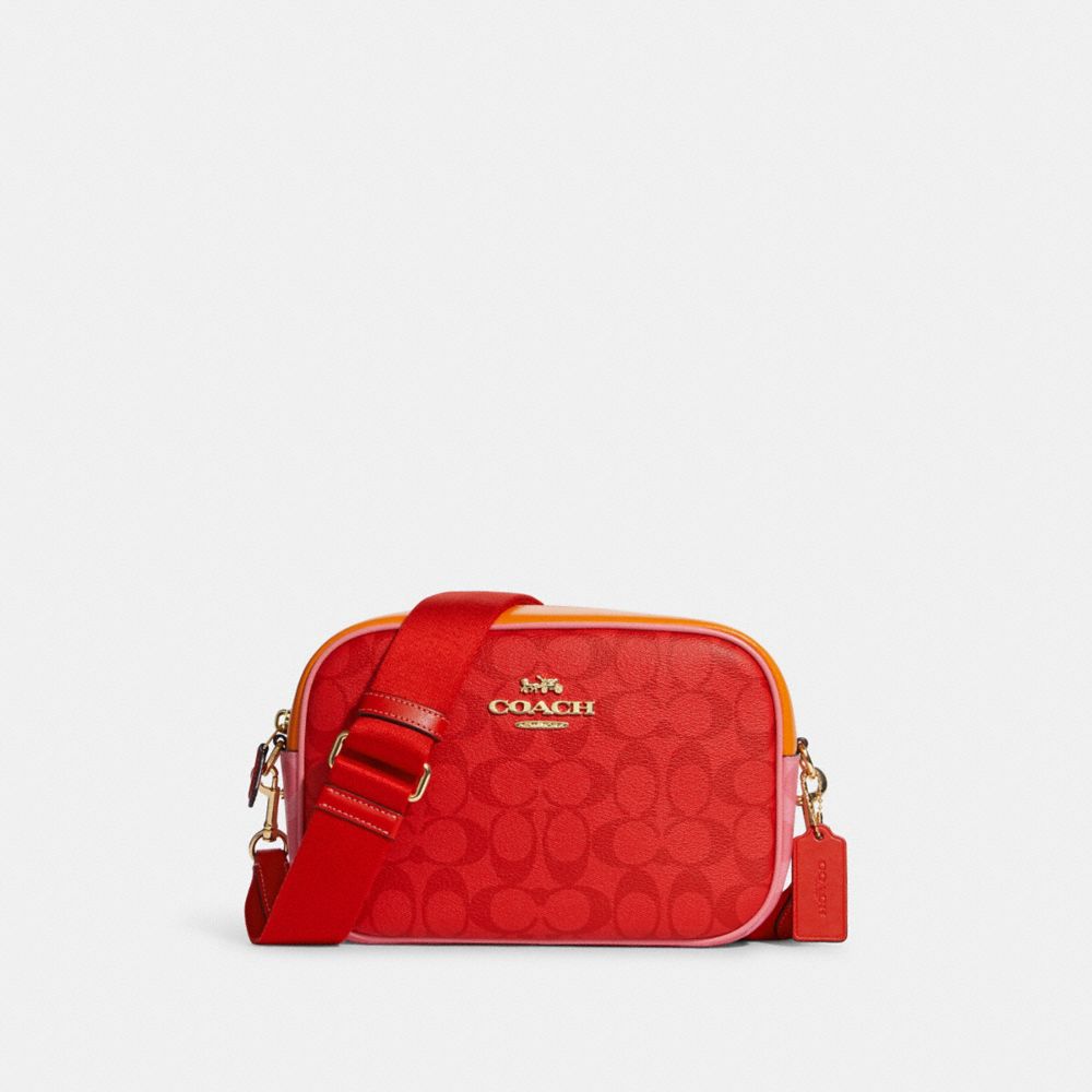 COACH Jes Crossbody Bag In Signature Canvas in Red