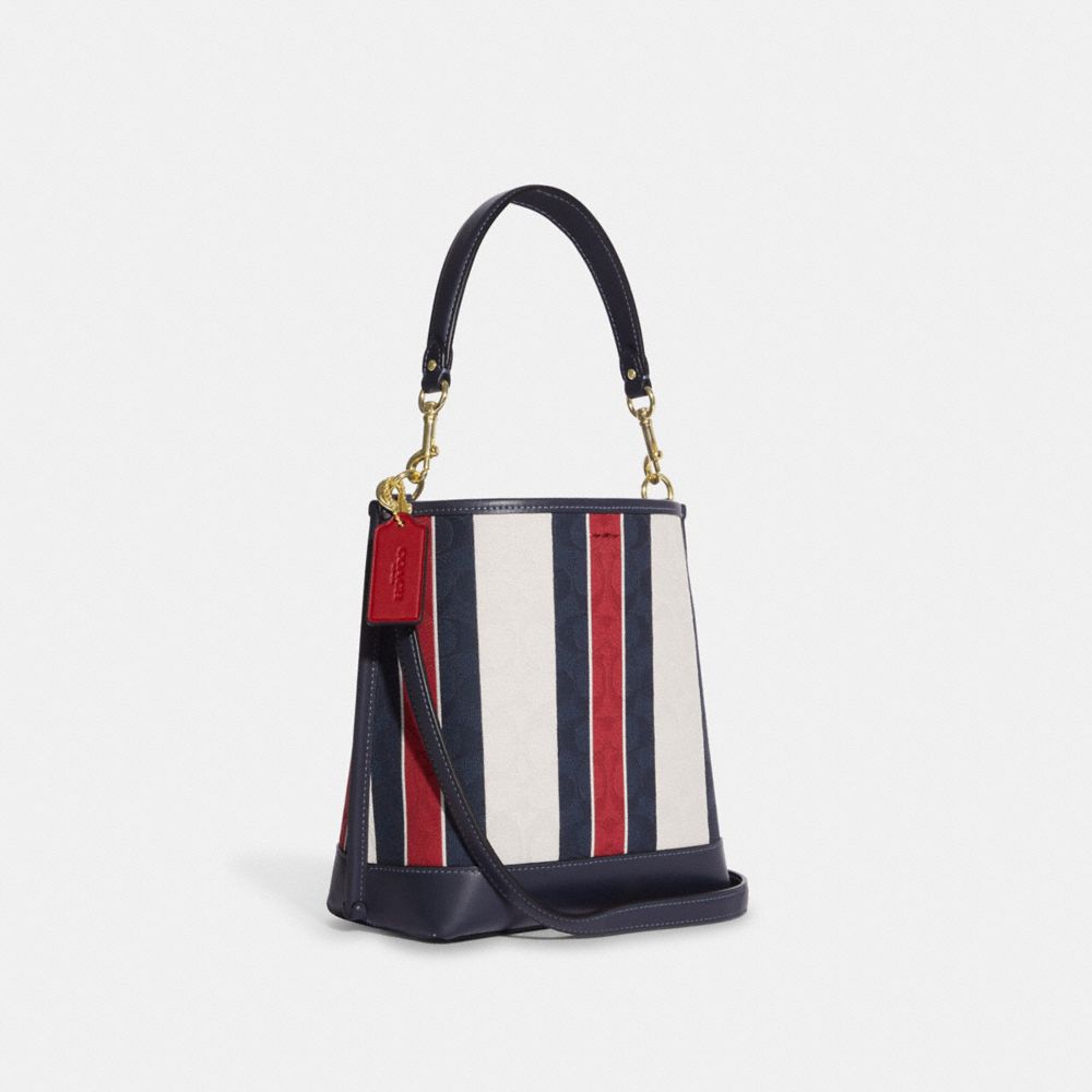 COACH OUTLET®  Mollie Bucket Bag 22 In Signature Canvas