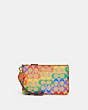 COACH®,SMALL WRISTLET IN RAINBOW SIGNATURE CANVAS,Signature Coated Canvas/Leather,Mini,Brass/Tan Natural Multi,Front View