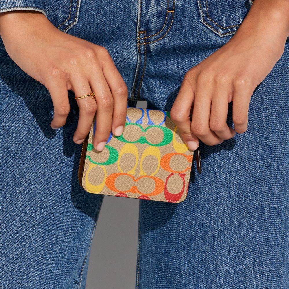 COACH® | Billfold Wallet In Rainbow Signature Canvas