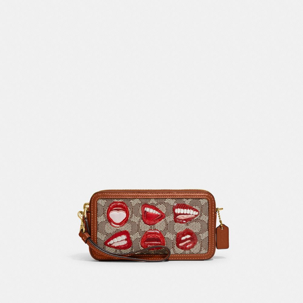 COACH®,COACH X TOM WESSELMANN KIRA CROSSBODY BAG IN SIGNATURE TEXTILE JACQUARD,Mini,Brass/Cocoa Burnished Amb,Front View image number 0
