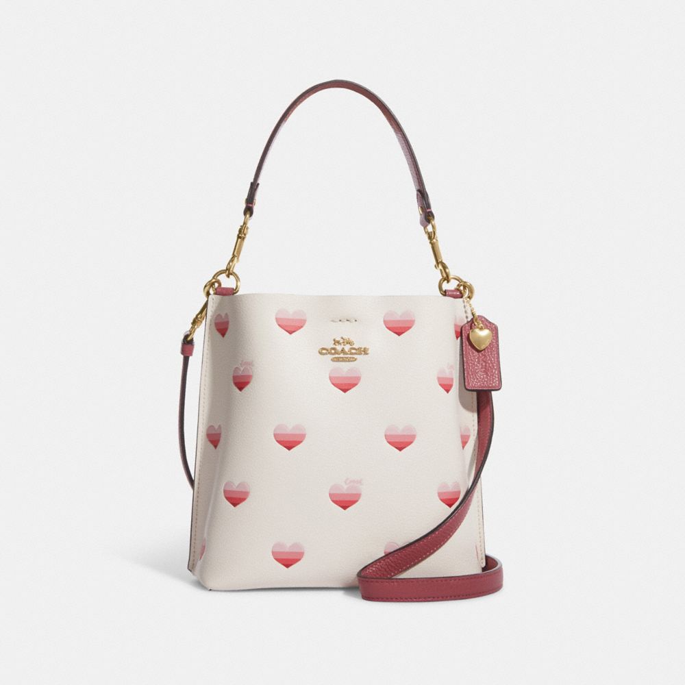 COACH®  Mollie Bucket Bag In Signature Canvas With Heart Cherry Print