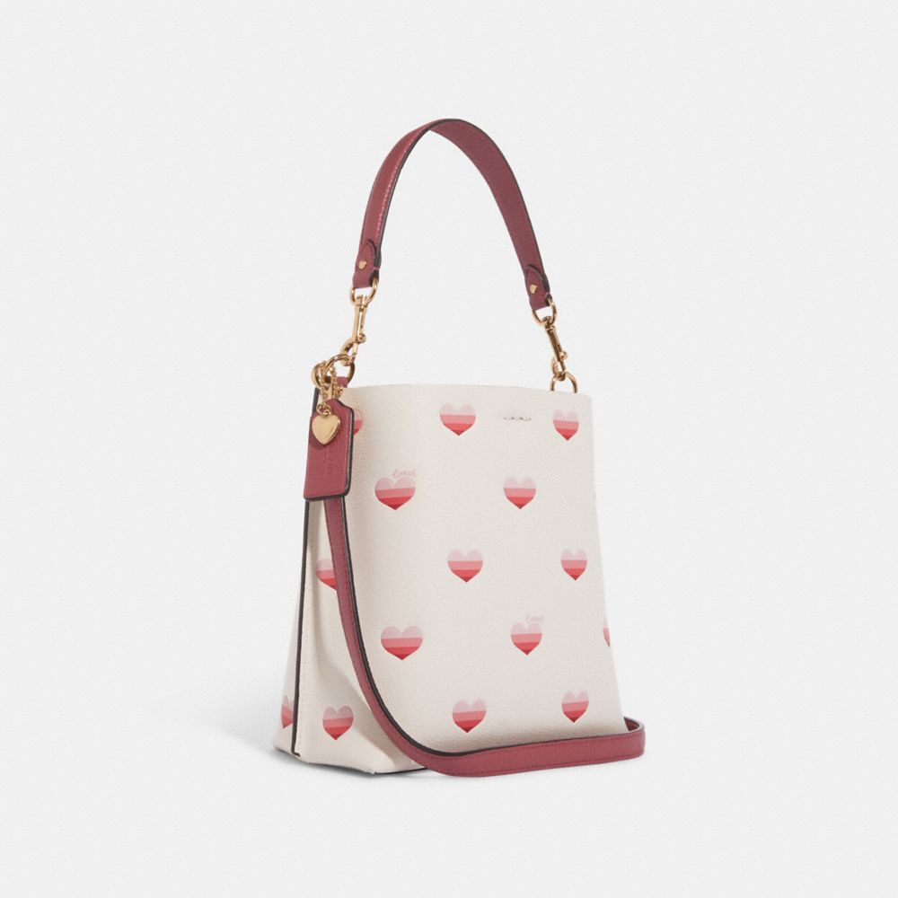 Coach cf422 Mollie Bucket 22 With Heart Cherry Print In Gold/Chalk