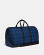 COACH®,GOTHAM DUFFLE BAG IN SIGNATURE LEATHER,Polished Pebble Leather,X-Large,Blue Fin/Black,Angle View