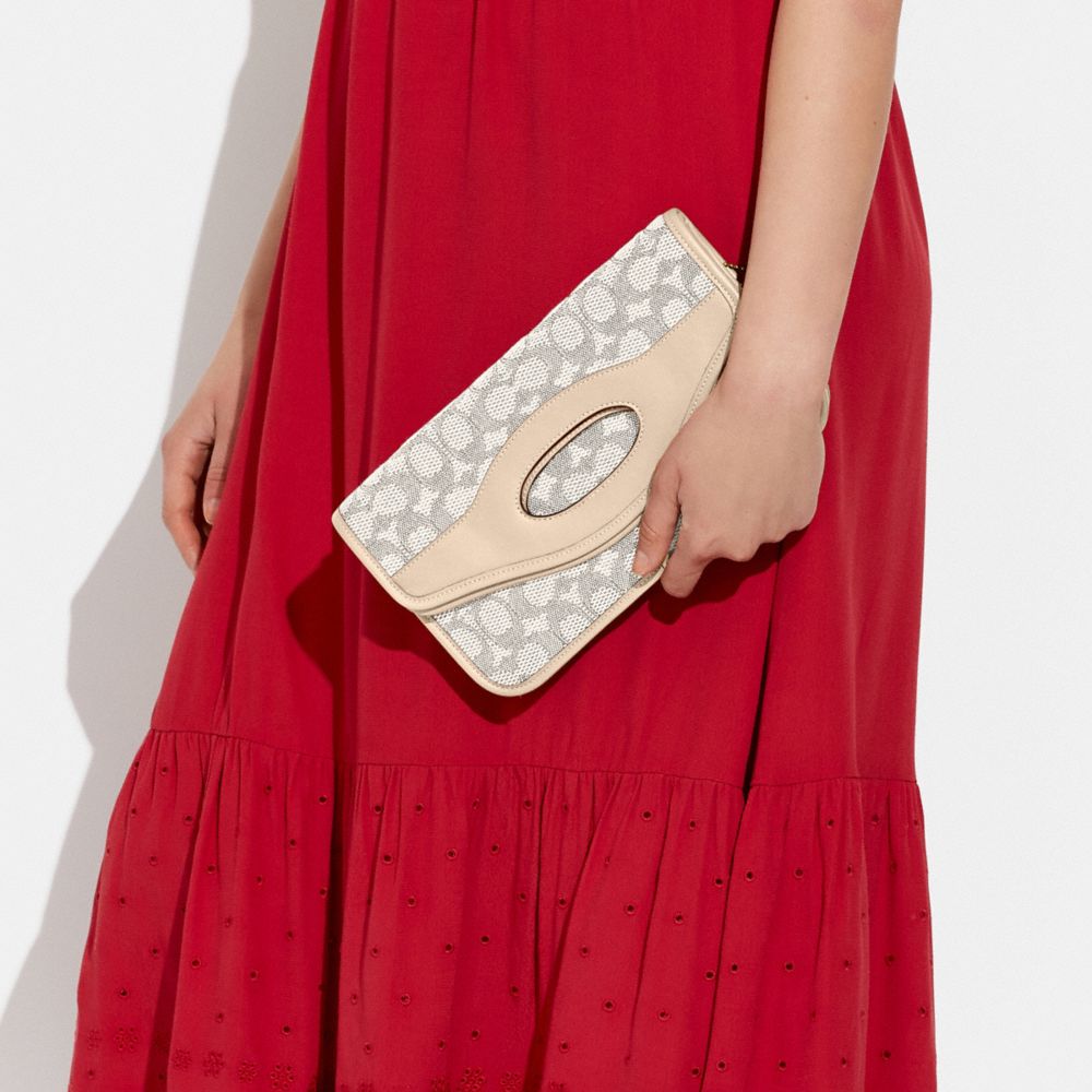 COACH®,Foldover Cut Out Clutch Crossbody In Signature Jacquard,,Detail View