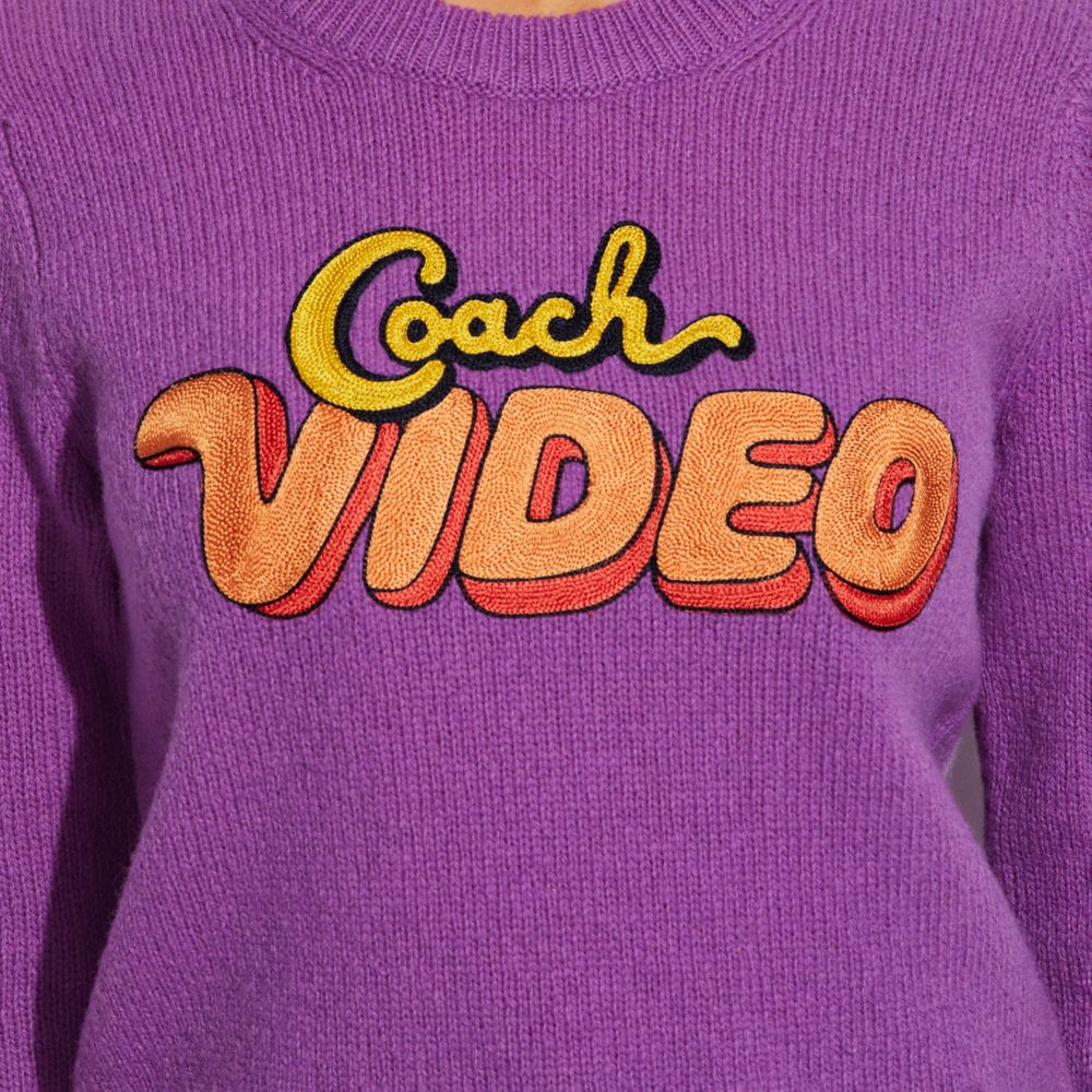 公式】COACH – コーチ | ビデオ クルーネック セーター