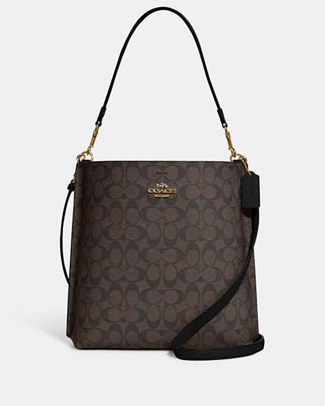 COACH®,MOLLIE BUCKET BAG IN SIGNATURE CANVAS,Leather,Large,Anniversary,Gold/Brown Black,Front View