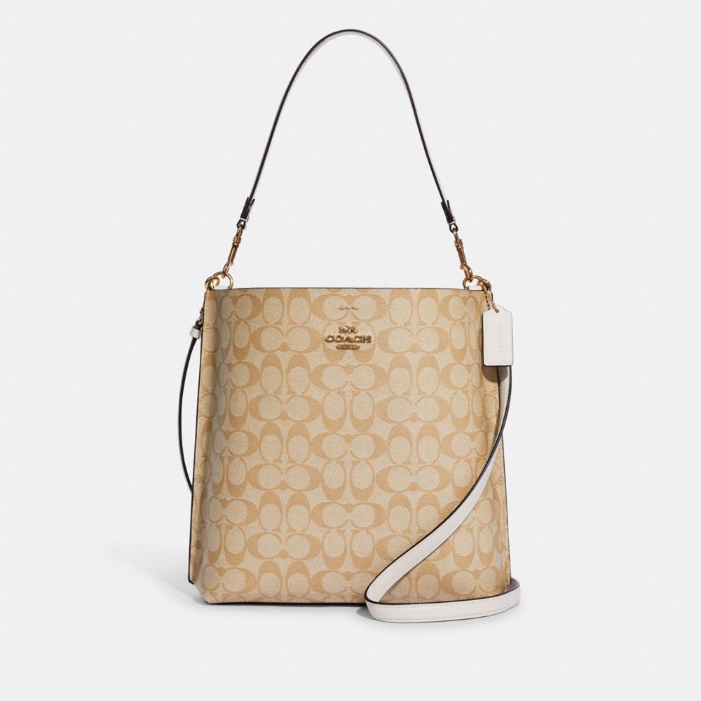 COACH®,MOLLIE BUCKET BAG IN SIGNATURE CANVAS,Large,Anniversary,Gold/Light Khaki Chalk,Front View