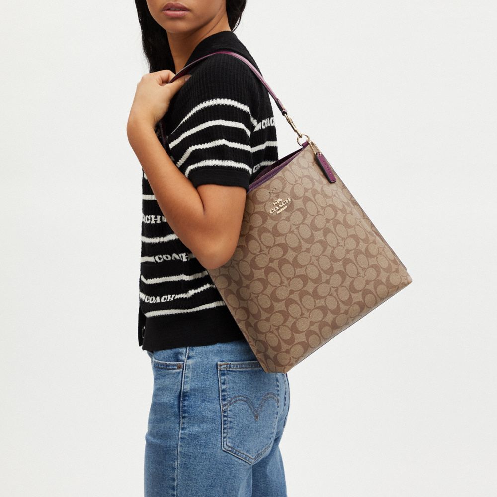 COACH®  Mollie Bucket Bag In Signature Canvas With Heart Cherry Print