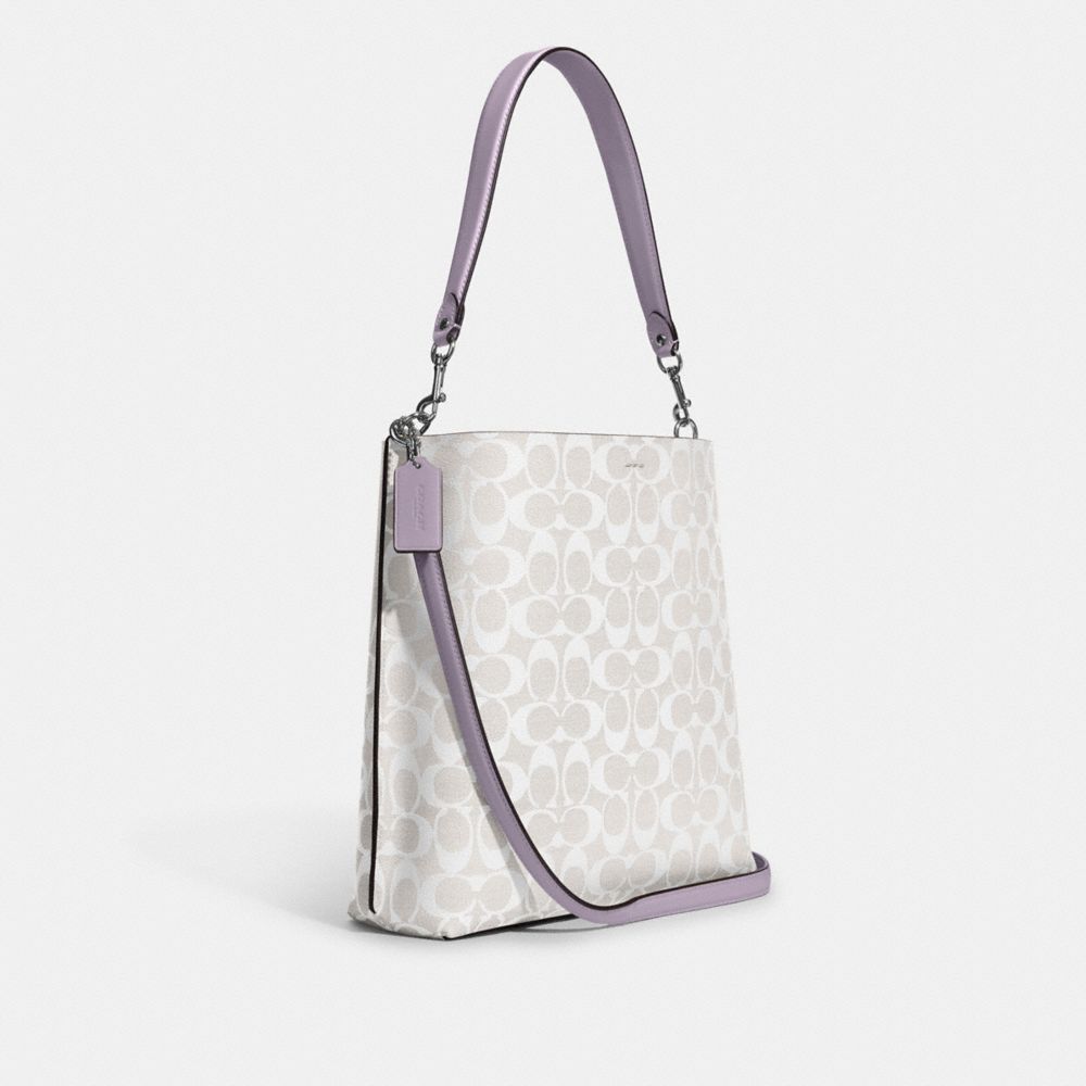 COACH®,Mollie Bucket Bag In Signature Canvas,Canvas,Leather,Crossbody,Logo,Gold Metal,Casual,,Angle View