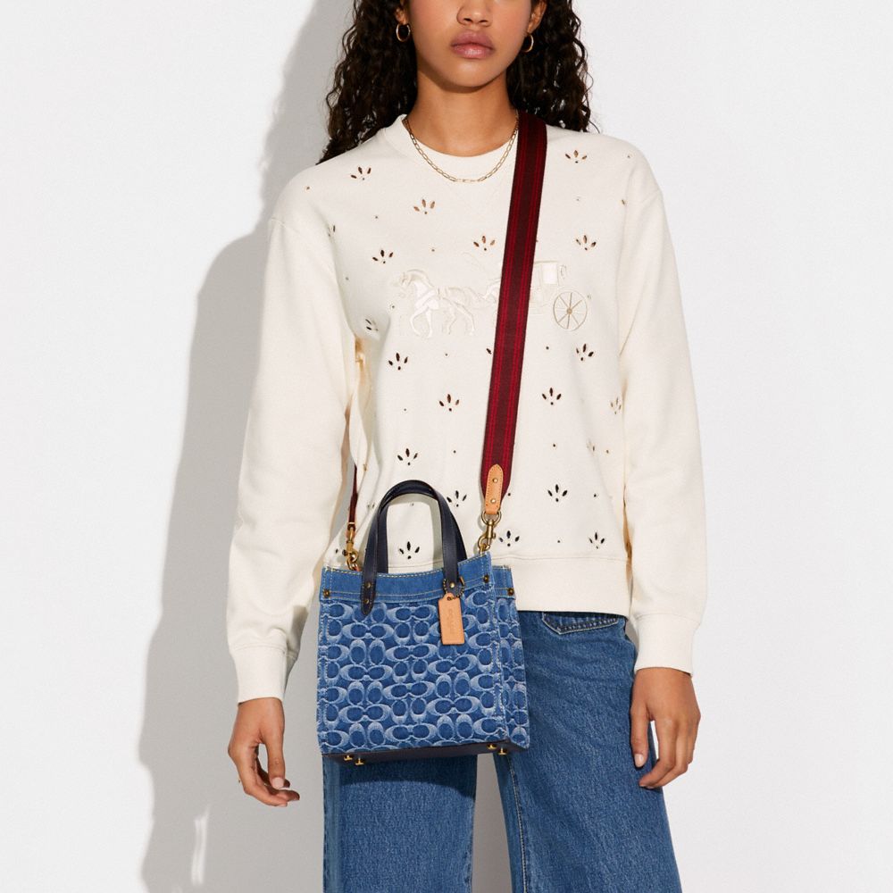 NEW!!! Must see this new denim line is fire 🔥 Coach field tote in