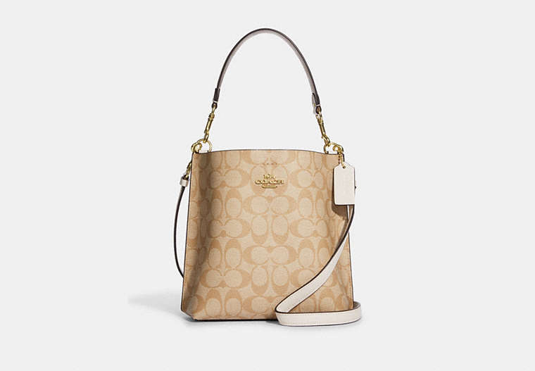 COACH®,MOLLIE BUCKET BAG 22 IN SIGNATURE CANVAS,Leather,Medium,Everyday,Gold/Light Khaki Chalk,Front View image number 0