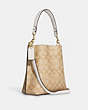 COACH®,MOLLIE BUCKET BAG 22 IN SIGNATURE CANVAS,Leather,Medium,Everyday,Gold/Light Khaki Chalk,Angle View