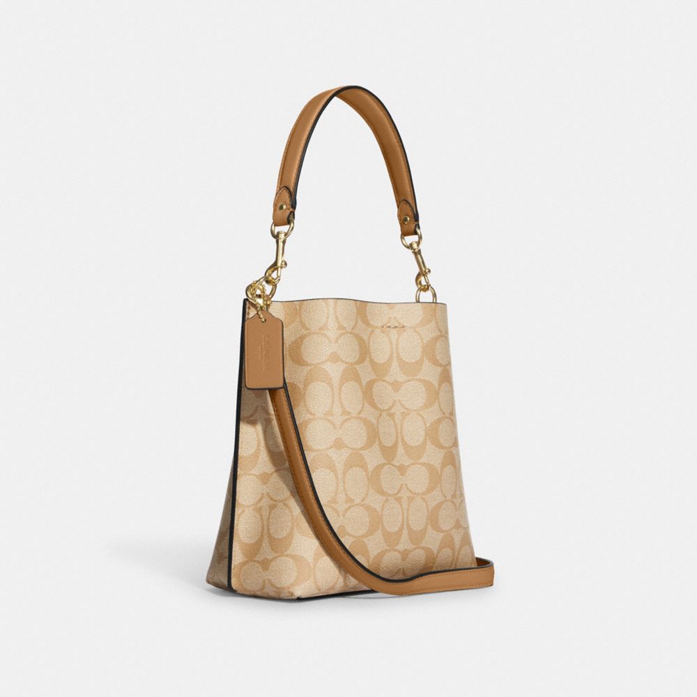 COACH®,MOLLIE BUCKET BAG 22 IN SIGNATURE CANVAS,Signature Canvas,Medium,Everyday,Gold/Lt Khaki/Lt Saddle,Angle View