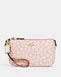 COACH®,NOLITA 19 WITH GRAPHIC DITSY FLORAL PRINT,Mini,Gold/Pink Multi,Front View