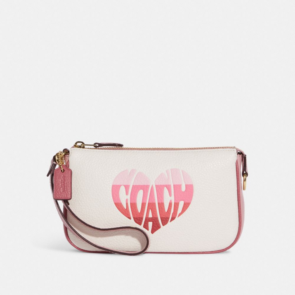 COACH Nolita Wristlet 15 In Pebble Leather in Pink