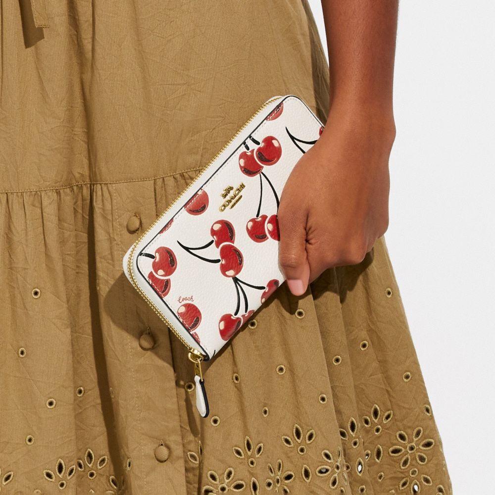 COACH® | Accordion Zip Wallet With Cherry Print