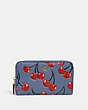 COACH®,MEDIUM ZIP AROUND WALLET WITH CHERRY PRINT,Pebble Leather,Mini,Brass/Washed Chambray,Front View
