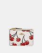 COACH®,MINI SKINNY ID CASE WITH CHERRY PRINT,Pebble Leather,Mini,Brass/Chalk,Front View