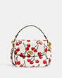 COACH®,CASSIE CROSSBODY BAG 19 WITH CHERRY PRINT,Refined Pebble Leather,Small,Brass/Chalk,Front View