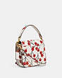COACH®,CASSIE CROSSBODY BAG 19 WITH CHERRY PRINT,Pebble Leather,Small,Brass/Chalk,Angle View