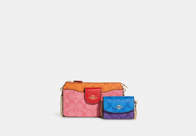 COACH®,POPPY CROSSBODY WITH CARD CASE IN BLOCKED SIGNATURE CANVAS,Mini,Gold/Pink Lemonade Multi,Front View