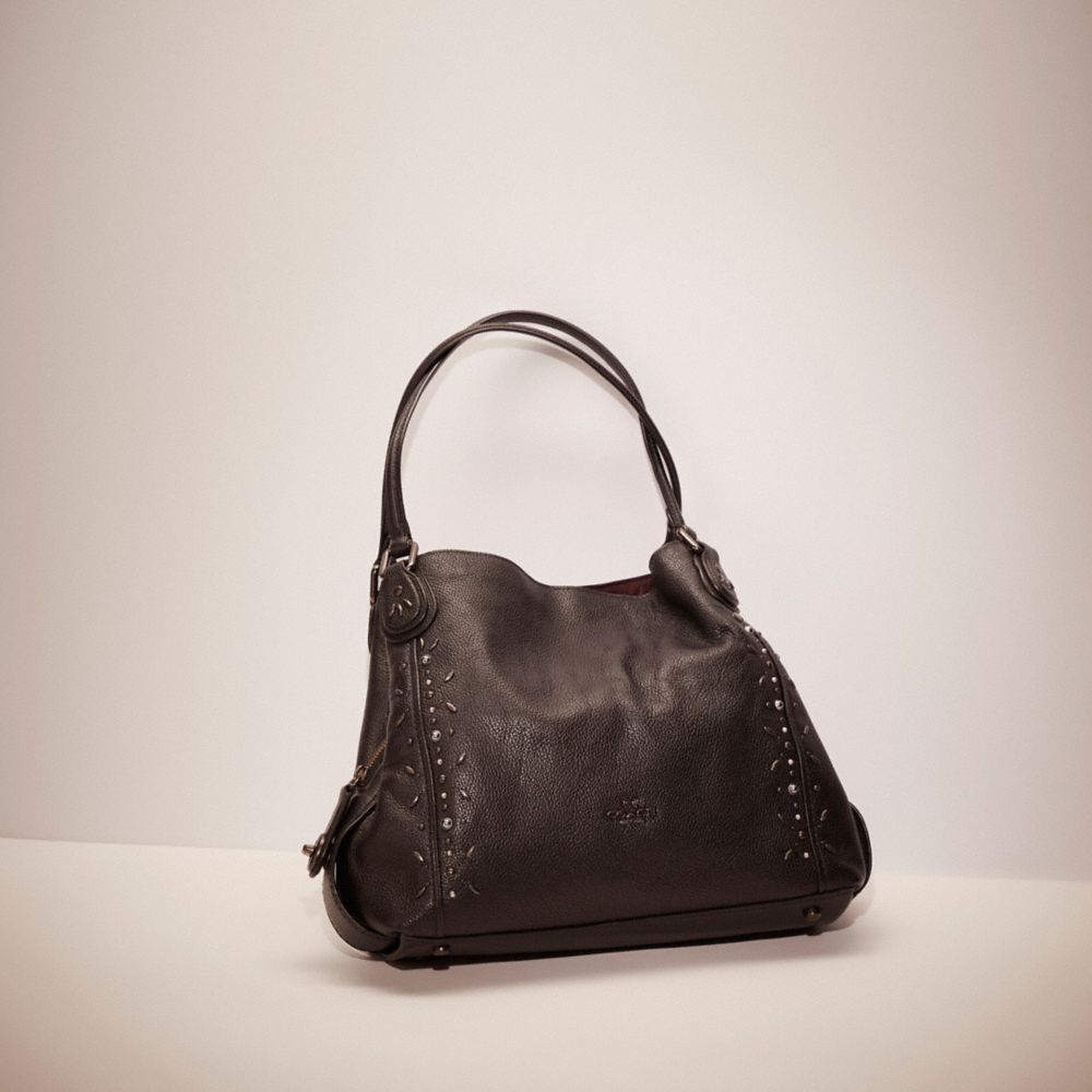 Edie 31 signature embossed leather shoulder bag online