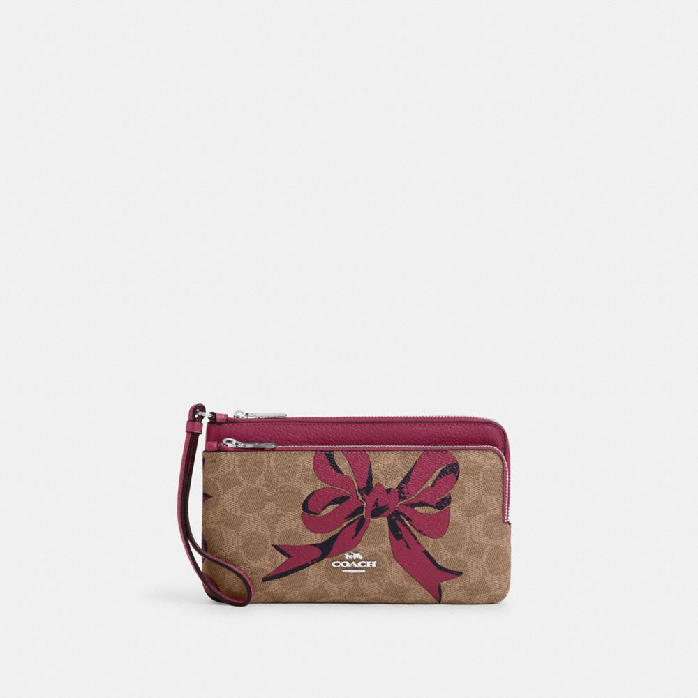 COACH®,Double Zip Wallet In Signature Canvas With Bow Print,,Front View