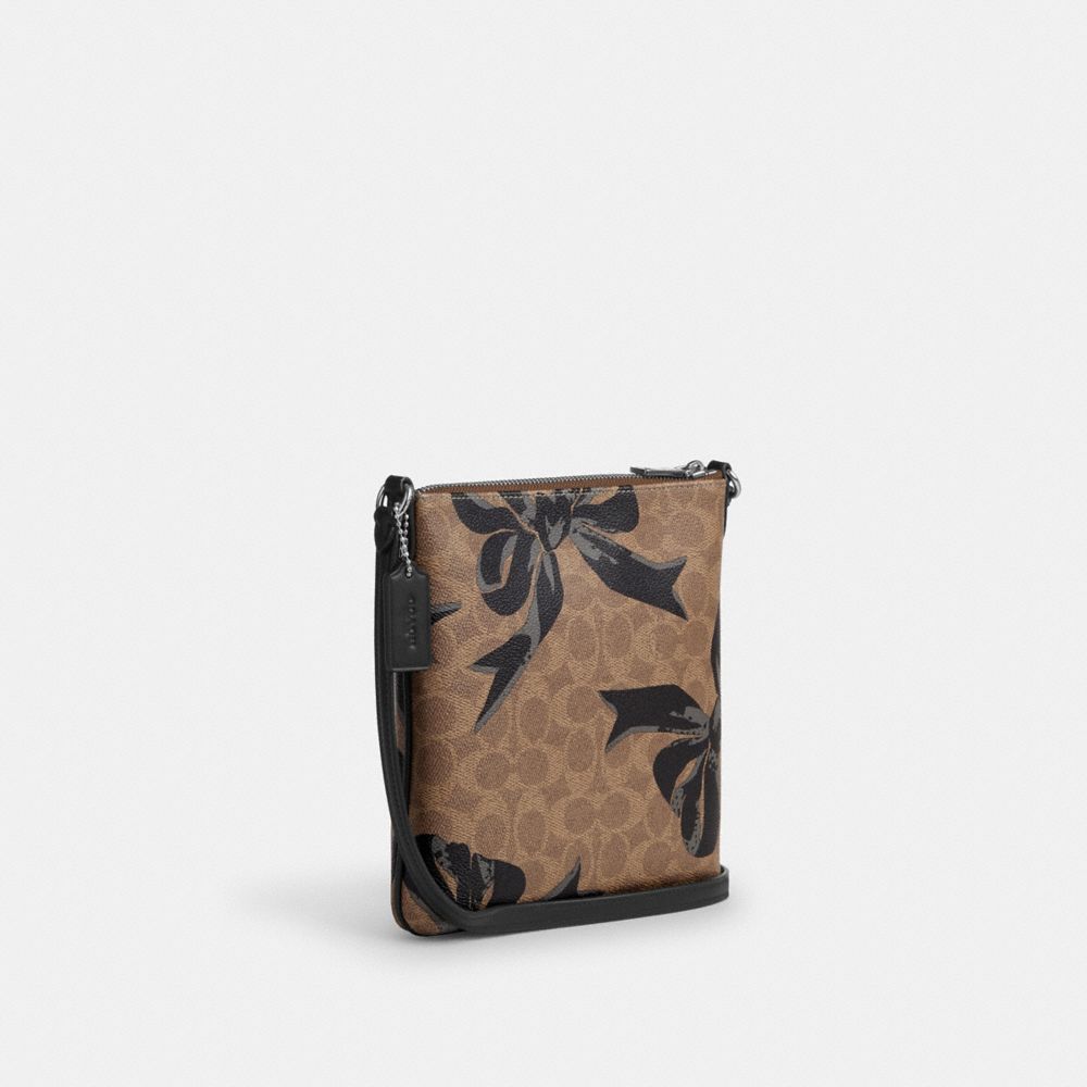 COACH®,Mini Rowan File Bag In Signature Canvas With Bow Print,,Angle View