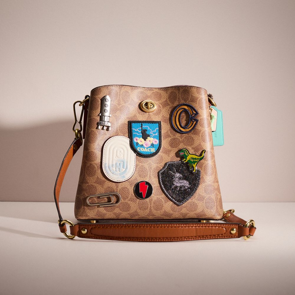 COACH®,Upcrafted Willow Bucket Bag In Signature Canvas,Leather,Bucket,Applique,Circle,Metal,Studded,Silver Metal,Day Party,Brown,Front View