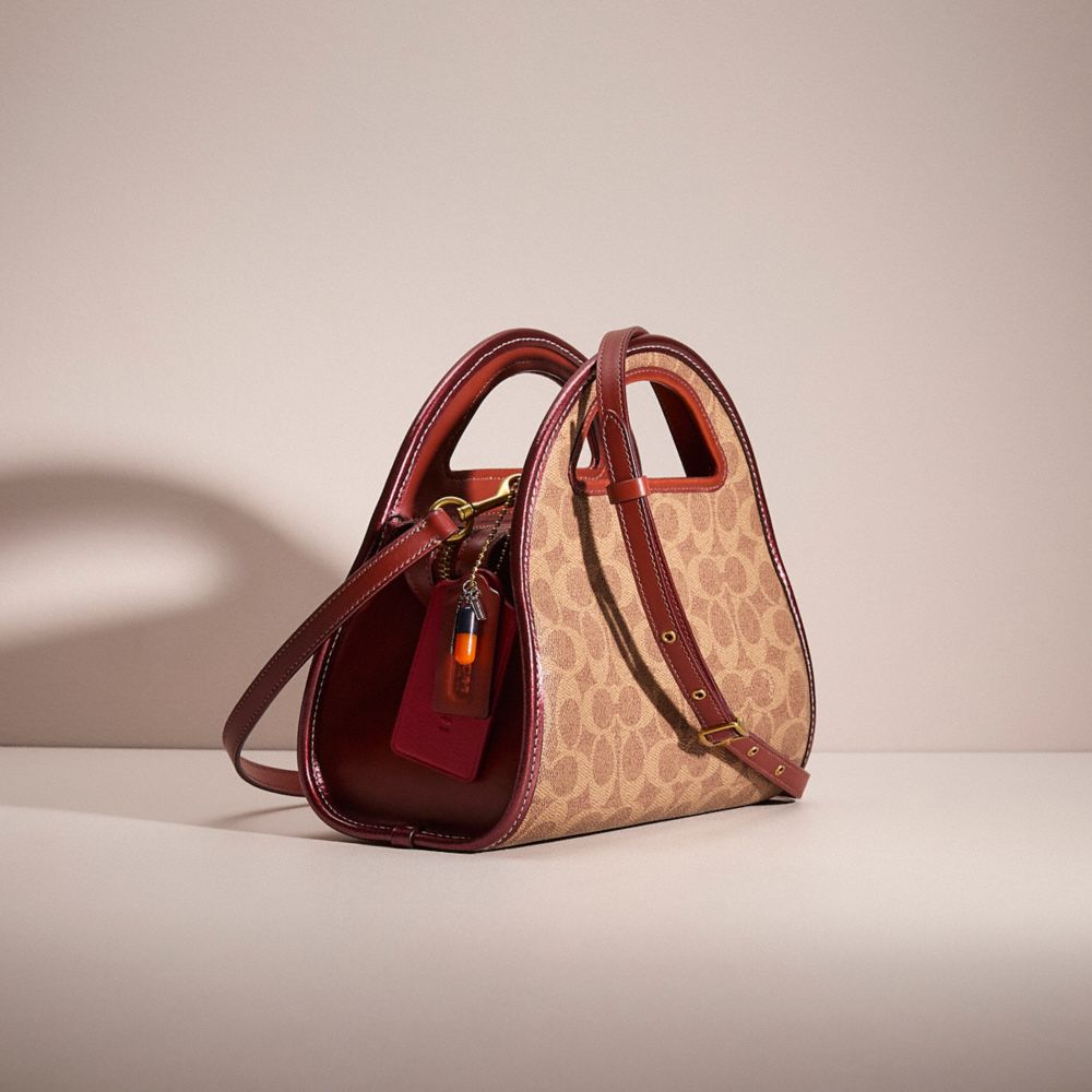 COACH®,Upcrafted Zip Dome Crossbody In Signature Canvas,Leather,Crossbody,Applique,Piping,Mixed Metal,Day Party,Brown,Angle View