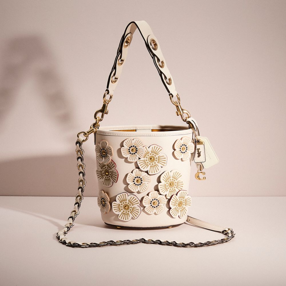COACH®,Upcrafted Dakota Bucket Bag 16,Leather,Bucket,Applique,Logo,Metal,Chain Detail,Gold Metal,Day Party,Cream,Front View