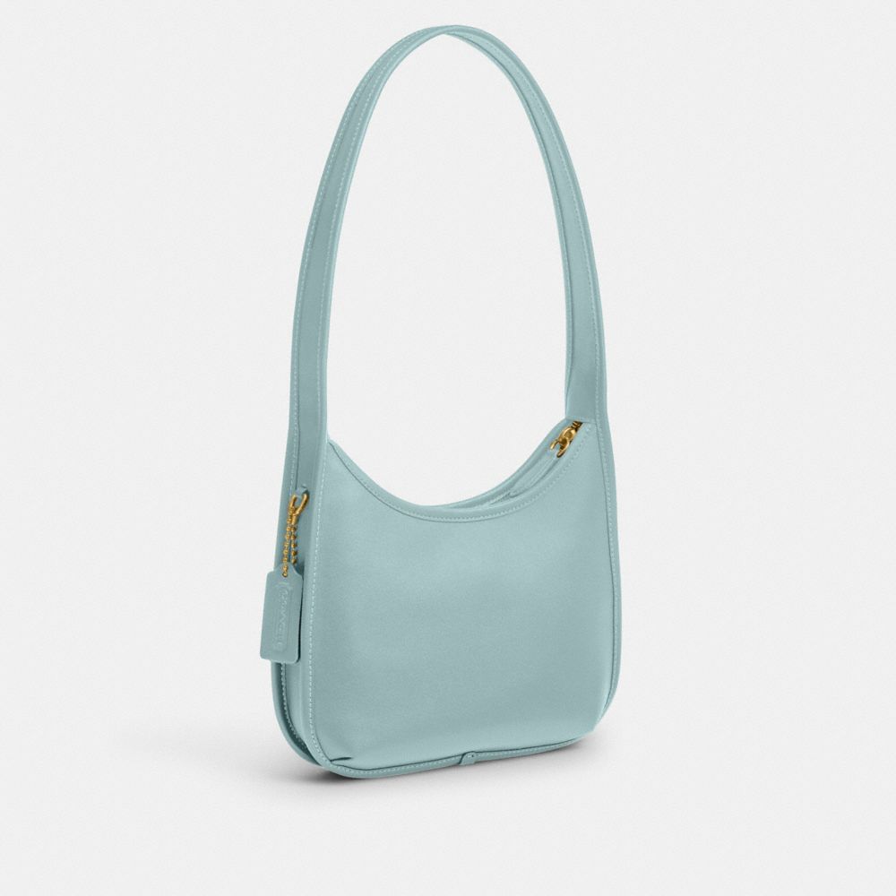Coach Curve Zip Bag In Brass/light Blue