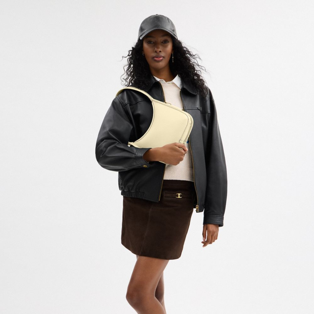 Coach Curve Zip Bag In Brass/moonlight